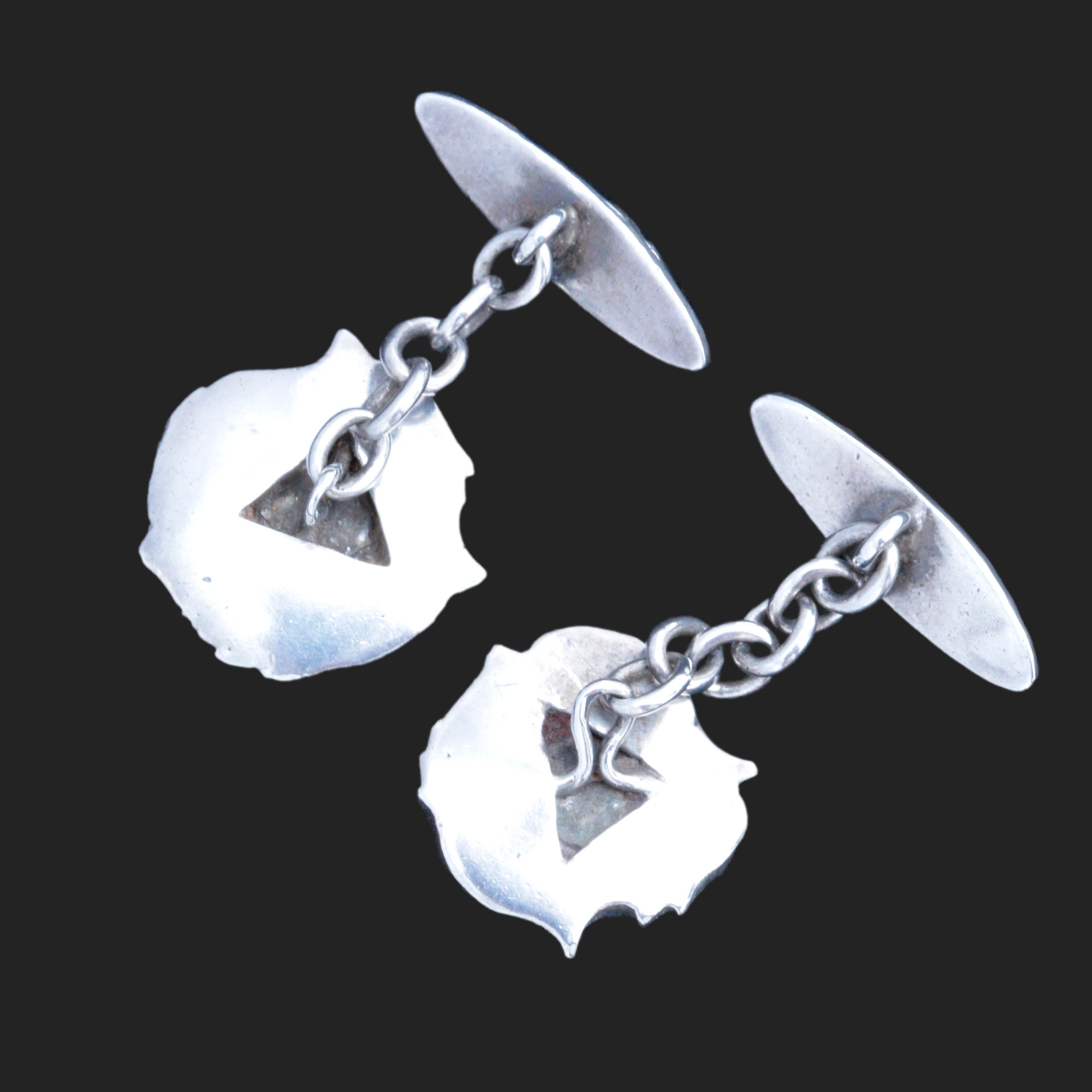 A pair of arts and crafts cufflinks attributed to Henry Wilson - Image 2